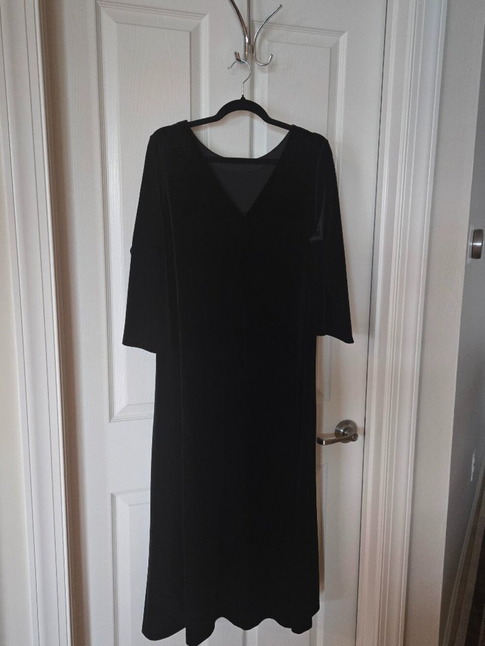Chicos black velvet Travelers dress with V back.